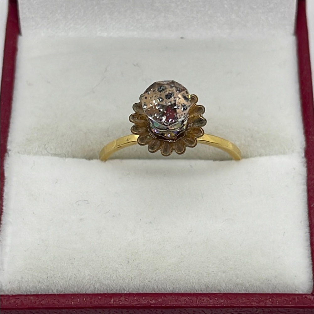 Elegant Gold Ring with Unique Stone